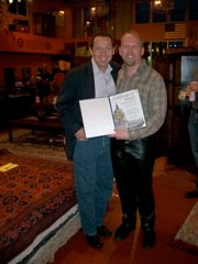 Supervisor Bevan Dufty presents REAL BAD XVI with a City proclamation